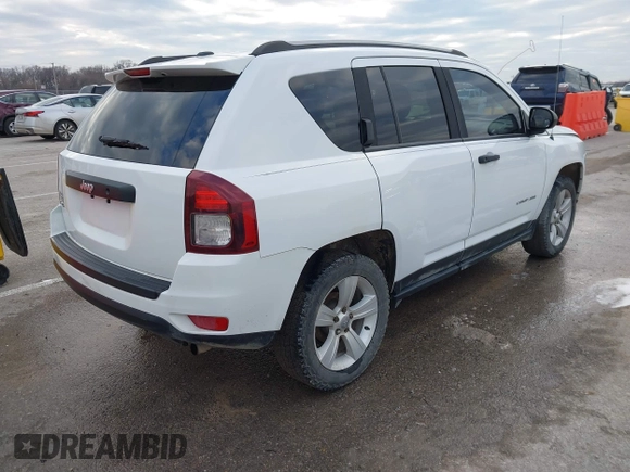 2016 Jeep Compass Sport with VIN 1C4NJDBB5GD804581, listed as a IAAI auction lot 41502976 with 196,351 mi miles and . Bid and sale history available at carsss.com. Image 4.