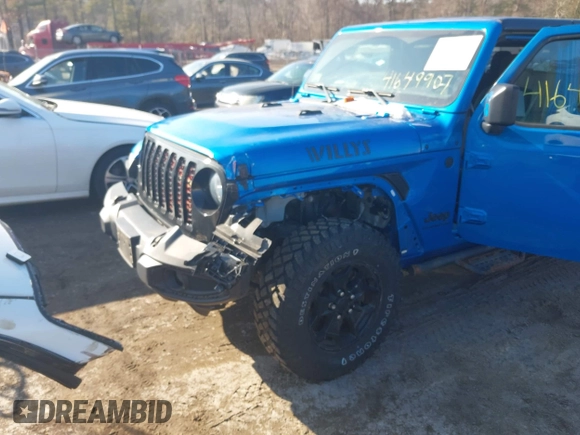 2021 Jeep Gladiator Willys with VIN 1C6HJTAG3ML572690, listed as a IAAI auction lot 41649907 with 74,734 mi miles and . Bid and sale history available at DreamBid. Image 6.