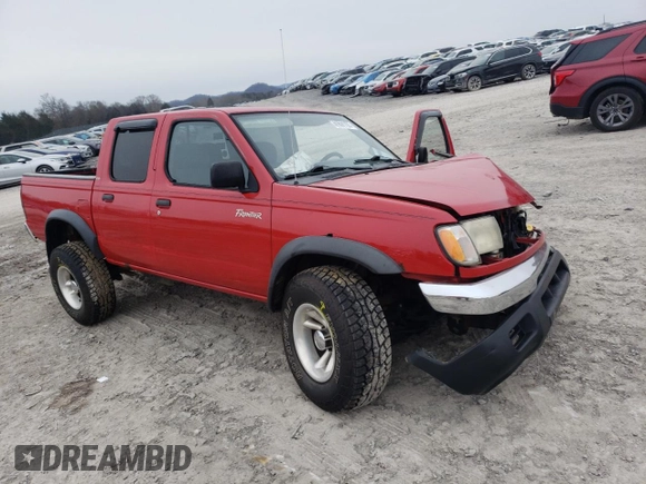 2000 Nissan Frontier XE with VIN 1N6ED27Y8YC324175, listed as a Copart auction lot 41891105 with 239,068 mi miles and Clean title. Bid and sale history available at DreamBid. Image 4.