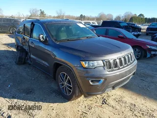 2018 Jeep Grand Cherokee Laredo E with VIN 1C4RJEAGXJC402718, listed as a IAAI auction lot 41362358 with 82,630 mi miles and . Bid and sale history available at DreamBid. Image 1.