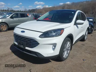 2022 Ford Escape Titanium with VIN 1FMCU9J93NUA99685, listed as a IAAI auction lot 41867437 with 36,987 mi miles and . Bid and sale history available at DreamBid. Image 2.