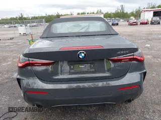 2023 BMW 4 Series 430i with VIN WBA23AT03PCL21070, listed as a IAAI auction lot 42730718 with 19,859 mi miles and . Bid and sale history available at DreamBid. Image 16.