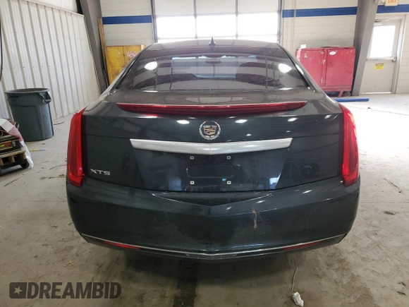 2014 Cadillac XTS with VIN 2G61L5S30E9159696, listed as a Copart auction lot 87954675 with 31,920 mi miles and Salvage Title. Bid and sale history available at carsss.com. Image 6.
