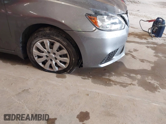 2019 Nissan Sentra S z VIN 3N1AB7AP0KY458040, wystawiony jako IAAI lot #42233788 z przebiegiem 110 419 mil mil oraz . Historia ofert i sprzedaży dostępna na DreamBid. Obrazek 18.