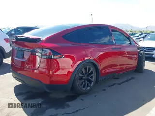 2023 Tesla Model X with VIN 7SAXCBE52PF416278, listed as a IAAI auction lot 42066747 with Not Provided miles and . Bid and sale history available at DreamBid. Image 4.