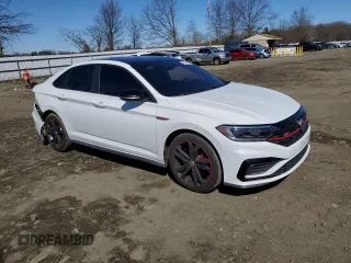 2019 Volkswagen Jetta GLI S with VIN 3VW5T7BU3KM161784, listed as a Copart auction lot 50157705 with 77,370 mi miles and Salvage Title. Bid and sale history available at DreamBid. Image 4.