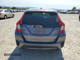 2015 Honda Fit LX z VIN 3HGGK5G52FM719166, wystawiony jako Copart lot #61162425 z przebiegiem 172 075 mil mil oraz Czysty tytuł • Clean title. Historia ofert i sprzedaży dostępna na DreamBid. Obrazek 6.