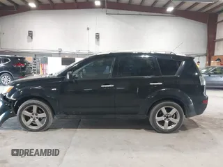 2007 Mitsubishi Outlander XLS z VIN JA4MT41X87Z001991, wystawiony jako IAAI lot #42200951 z przebiegiem 202 866 mil mil oraz . Historia ofert i sprzedaży dostępna na DreamBid. Obrazek 14.