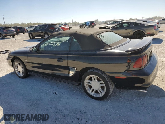 1996 Ford Mustang GT with VIN 1FALP45X3TF204806, listed as a Copart auction lot 84204974 with 137,676 mi miles and Salvage Title. Bid and sale history available at carsss.com. Image 2.
