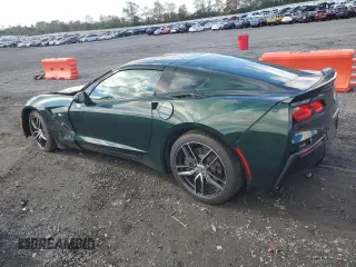 2014 Chevrolet Corvette 2LT with VIN 1G1YC2D7XE5127466, listed as a Copart auction lot 74580694 with 14,516 mi miles and Salvage Title. Bid and sale history available at carsss.com. Image 2.
