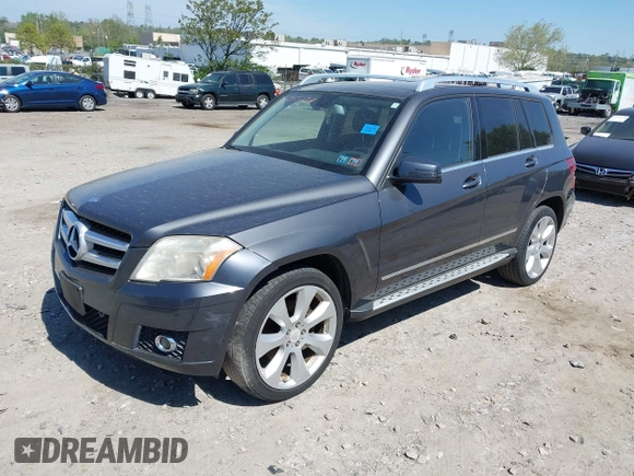 2010 Mercedes-Benz GLK with VIN WDCGG8HB8AF464015, listed as a IAAI auction lot 42155107 with 116,787 mi miles. Bid and sale history available at carsss.com. Image 2.