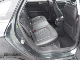 2015 Ford Fusion SE z VIN 1FA6P0HD9F5101925, wystawiony jako IAAI lot #42314400 z przebiegiem 159 548 mil mil oraz . Historia ofert i sprzedaży dostępna na DreamBid. Obrazek 8.