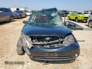 2007 Ford Focus S with VIN 1FAFP31NX7W130558, listed as a Copart auction lot 58385805 with Not provided miles and Non repairable. Bid and sale history available at DreamBid. Image 5.