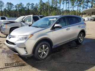 2018 Toyota RAV4 XLE with VIN JTMWFREV1JJ205906, listed as a Copart auction lot 84700564 with 64,953 mi miles and Salvage Title. Bid and sale history available at DreamBid. Image 1.