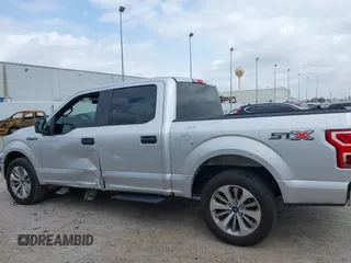 2018 Ford F-150 XL with VIN 1FTEW1CP9JKC79991, listed as a IAAI auction lot 41737265 with 123,655 mi miles and . Bid and sale history available at DreamBid. Image 14.