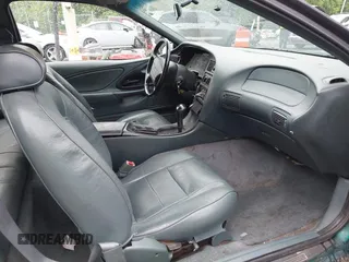 1996 Ford Thunderbird LX z VIN 1FALP62W9TH118637, wystawiony jako IAAI lot #42311641 z przebiegiem 96 361 mil mil oraz . Historia ofert i sprzedaży dostępna na DreamBid. Obrazek 5.