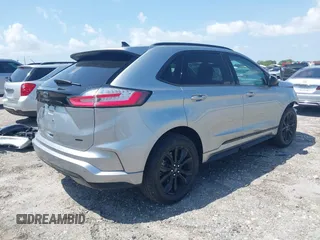 2024 Ford Edge SE with VIN 2FMPK4G91RBA63054, listed as a IAAI auction lot 41973609 with 14,707 mi miles and . Bid and sale history available at DreamBid. Image 4.