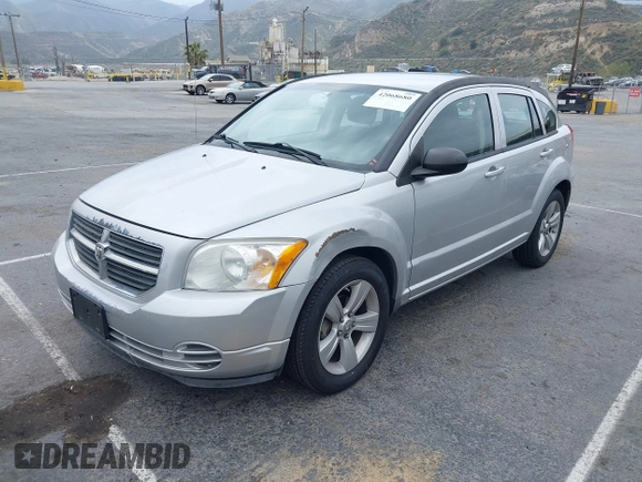 2010 Dodge Caliber SXT z VIN 1B3CB4HA9AD619378, wystawiony jako IAAI lot #42068680 z przebiegiem 182 668 mil mil oraz . Historia ofert i sprzedaży dostępna na DreamBid. Obrazek 2.
