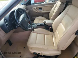 1999 BMW 3 Series z VIN WBABK8330XEY91814, wystawiony jako Copart lot #79799074 z przebiegiem 63 783 mil mil oraz Szkoda całkowita • Salvage title. Historia ofert i sprzedaży dostępna na DreamBid. Obrazek 7.
