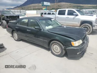 1999 Infiniti Q45 z VIN JNKBY31A6XM600579, wystawiony jako Copart lot #57683075 z przebiegiem 215 415 mil mil oraz Szkoda całkowita • Salvage title. Historia ofert i sprzedaży dostępna na DreamBid. Obrazek 4.