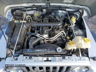 2004 Jeep Wrangler Rubicon with VIN 1J4FA69S14P766938, listed as a Copart auction lot 46284815 with 165,229 mi miles and Salvage Title. Bid and sale history available at carsss.com. Image 11.