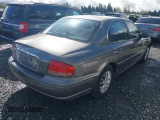 2004 Hyundai Sonata with VIN KMHWF25SX4A963868, listed as a IAAI auction lot 41973317 with 191,843 mi miles. Bid and sale history available at carsss.com. Image 4.