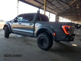 2021 Ford F-150 Raptor with VIN 1FTFW1RG2MFC58232, listed as a Copart auction lot 42979795 with 56,832 mi miles and Salvage Title. Bid and sale history available at carsss.com. Image 2.