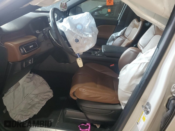 2021 Lincoln Aviator Reserve with VIN 5LM5J7XC9MGL13856, listed as a Copart auction lot 53813935 with 56,816 mi miles and Salvage title. Bid and sale history available at DreamBid. Image 7.