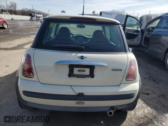2004 MINI Hardtop with VIN WMWRC33424TJ53673, listed as a Copart auction lot 47310755 with Not Provided miles and Clean Title. Bid and sale history available at DreamBid. Image 6.