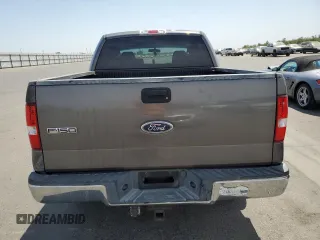 2004 Ford F-150 XLT with VIN 1FTRW12W74KC26169, listed as a Copart auction lot 68393914 with 118,059 mi miles and Salvage Title. Bid and sale history available at DreamBid. Image 6.