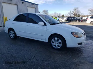 2009 Kia Spectra EX with VIN KNAFE221X95610496, listed as a Copart auction lot 82448784 with 206,627 mi miles and Salvage Title. Bid and sale history available at carsss.com. Image 4.