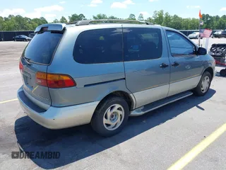 1999 Toyota Sienna LE z VIN 4T3ZF13C4XU118561, wystawiony jako IAAI lot #42536325 z przebiegiem 273 336 mil mil oraz . Historia ofert i sprzedaży dostępna na DreamBid. Obrazek 4.