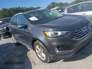 2020 Ford Edge SEL z VIN 2FMPK3J91LBA77644, wystawiony jako IAAI lot #42054865 z przebiegiem 109 984 mil mil oraz . Historia ofert i sprzedaży dostępna na DreamBid. Obrazek 1.
