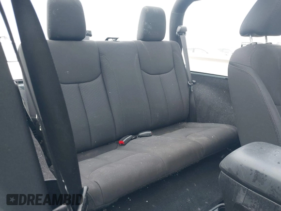 2015 Jeep Wrangler Sport with VIN 1C4AJWAG3FL589214, listed as a IAAI auction lot 41056259 with 101,758 mi miles and . Bid and sale history available at DreamBid. Image 8.