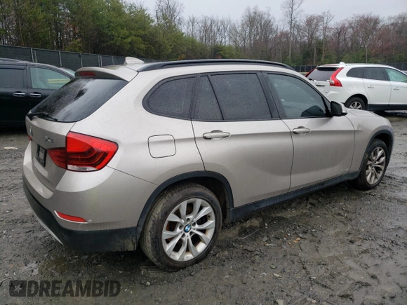 2014 BMW X1 xDrive28i with VIN WBAVL1C52EVY15236, listed as a Copart auction lot 50140885 with 141,088 mi miles and Salvage Title. Bid and sale history available at carsss.com. Image 3.