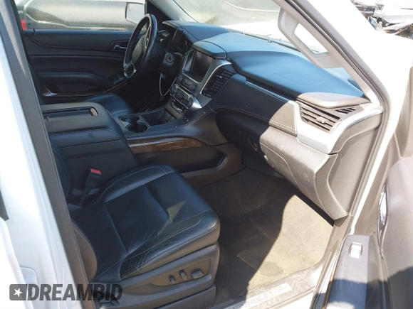 2015 Chevrolet Suburban LT with VIN 1GNSCJKC2FR680413, listed as a IAAI auction lot 41634666 with 127,175 mi miles and . Bid and sale history available at DreamBid. Image 5.