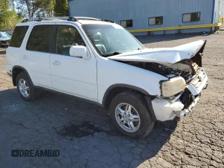 2000 Honda CR-V SE with VIN JHLRD1879YS022360, listed as a Copart auction lot 69876834 with 251,003 mi miles and Salvage Title. Bid and sale history available at carsss.com. Image 4.
