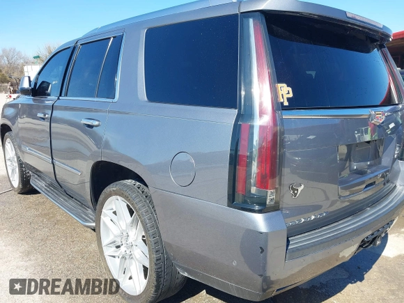 2018 Cadillac Escalade Luxury z VIN 1GYS3BKJ0JR147752, wystawiony jako IAAI lot #41419140 z przebiegiem 124 376 mil mil oraz . Historia ofert i sprzedaży dostępna na DreamBid. Obrazek 3.