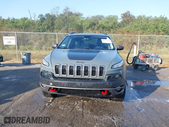 2014 Jeep Cherokee Trailhawk z VIN 1C4PJMBS2EW212341, wystawiony jako IAAI lot #40672694 z przebiegiem 108 622 mil mil oraz . Historia ofert i sprzedaży dostępna na DreamBid. Obrazek 12.