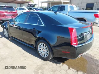 2013 Cadillac CTS Luxury with VIN 1G6DE5E51D0165634, listed as a IAAI auction lot 42208023 with 92,827 mi miles and . Bid and sale history available at DreamBid. Image 3.
