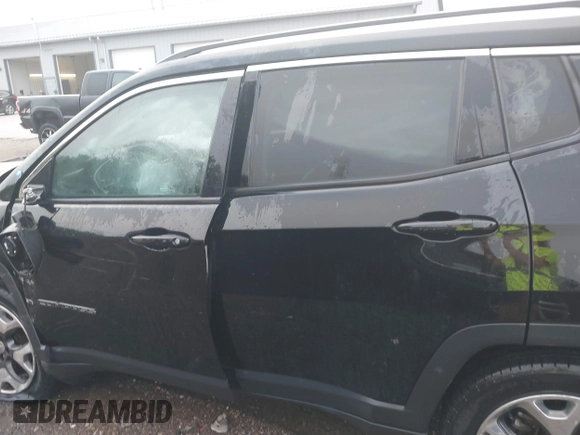 2018 Jeep Compass Limited with VIN 3C4NJDCB1JT354234, listed as a IAAI auction lot 39985028 with 76,293 mi miles. Bid and sale history available at carsss.com. Image 14.