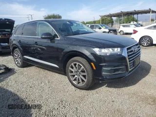 2019 Audi Q7 Premium Plus with VIN WA1LHAF7XKD024487, listed as a Copart auction lot 58400285 with 74,156 mi miles and Salvage title. Bid and sale history available at DreamBid. Image 4.