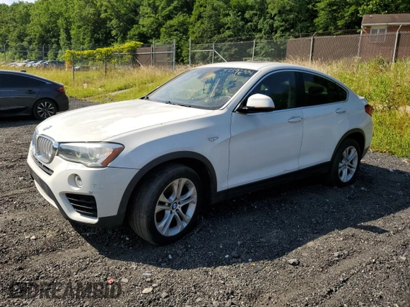 2015 BMW X4 xDrive28i with VIN 5UXXW3C51F0M89005, listed as a Copart auction lot 57392984 with 142,385 mi miles. Bid and sale history available at carsss.com. Image 1.