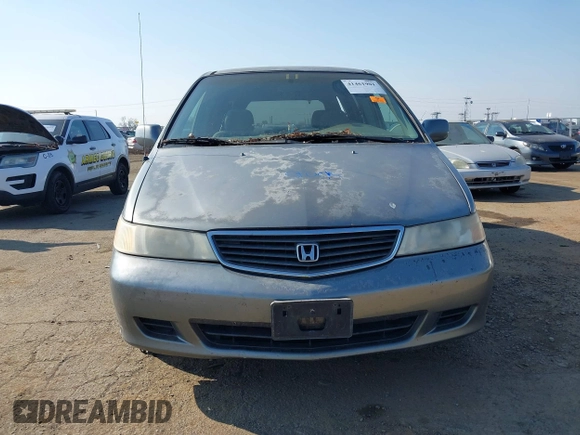 2000 Honda Odyssey EX z VIN 2HKRL187XYH619354, wystawiony jako IAAI lot #41461901 z przebiegiem Nie podano mil oraz . Historia ofert i sprzedaży dostępna na DreamBid. Obrazek 6.