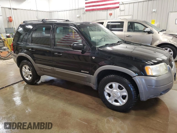 2002 Ford Escape XLT Choice z VIN 1FMCU04122KD33937, wystawiony jako Copart lot #63119335 z przebiegiem 161 809 mil mil oraz Czysty tytuł • Clean title. Historia ofert i sprzedaży dostępna na DreamBid. Obrazek 4.