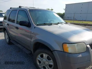 2001 Ford Escape XLT with VIN 1FMCU04101KB58456, listed as a IAAI auction lot 42479465 with 288,261 mi miles and . Bid and sale history available at DreamBid. Image 1.