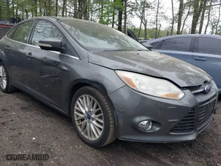 2012 Ford Focus SEL with VIN 1FAHP3H23CL348356, listed as a IAAI auction lot 42041001 with 174,510 mi miles. Bid and sale history available at carsss.com. Image 6.