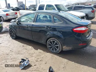 2015 Ford Fiesta SE with VIN 3FADP4BJ6FM150720, listed as a IAAI auction lot 41733922 with 98,336 mi miles. Bid and sale history available at carsss.com. Image 3.