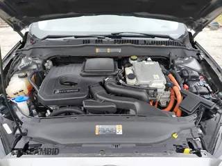 2014 Ford Fusion SE Hybrid with VIN 3FA6P0LU6ER285188, listed as a IAAI auction lot 42516215 with 122,899 mi miles and . Bid and sale history available at DreamBid. Image 10.
