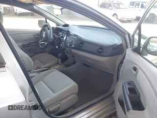2010 Honda Insight LX z VIN JHMZE2H53AS007016, wystawiony jako IAAI lot #42096274 z przebiegiem 173 519 mil mil oraz . Historia ofert i sprzedaży dostępna na DreamBid. Obrazek 5.